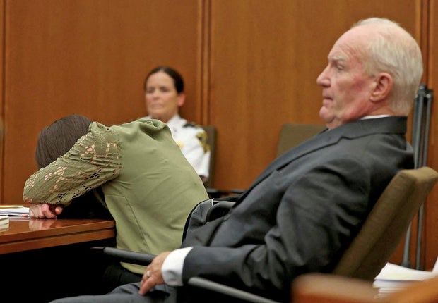 Defense attorney Kevin Reddington listens to graphic testimony as his client, Lindsay Clancy, sobs during her murder trial at Plymouth Superior Court in Plymouth, Massachusetts, Aug. 12, 2026. 