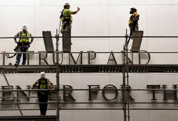Workers prepare to change Kennedy Center sign 