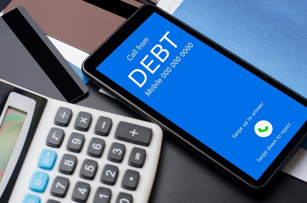 Top view of incoming call on smart phone screen from Creditor. Concept of business financial and debt. 